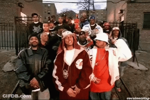 Group Of Men Standing In Front Of Building GIF