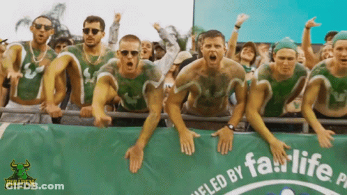 Group Of Men Standing In Front Of Bullpen Banner GIF