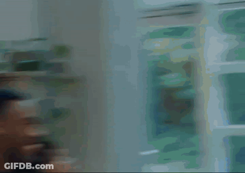 Group Of Men Standing In Living Room GIF