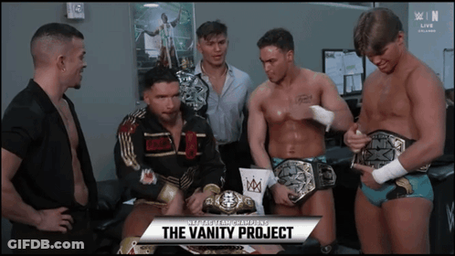 Group Of Men Standing In Room GIF