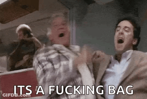 Group Of Men Standing On Baseball Field GIF