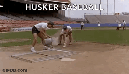 Group Of Men Standing On Baseball Field GIF