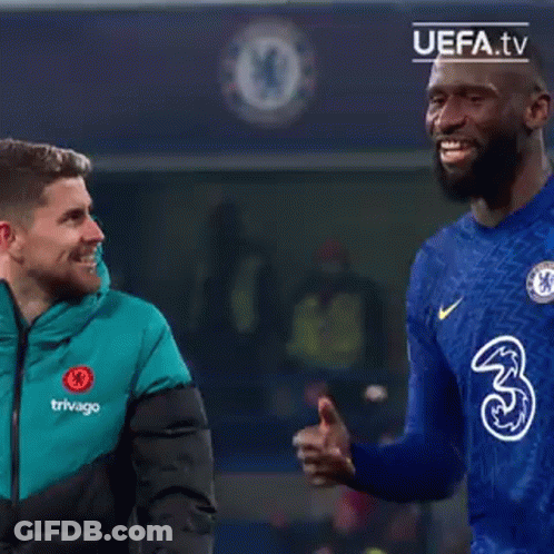 Group Of Men Standing On Field GIF