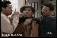 Group Of Men Standing Together One Wearing Hat GIF