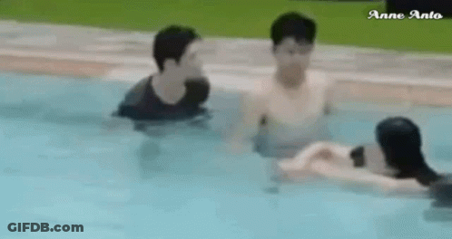 Group Of Men Swimming In Pool GIF
