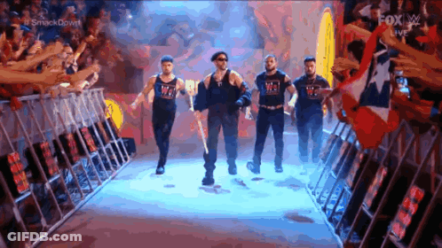 Group Of Men Walking Down Hallway With Fox Logo GIF