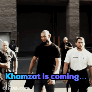 Group Of Men Walking Down Street Khamzat Is Coming GIF
