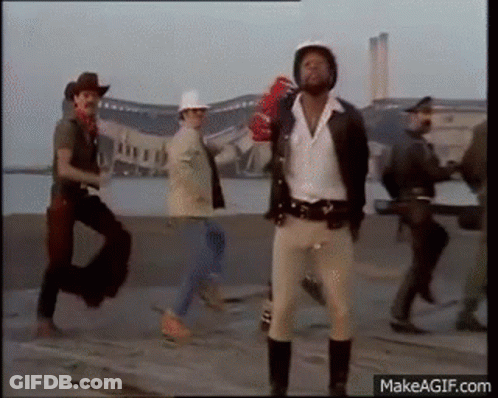 Group Of Men Walking Down Street One Holding Red Glove GIF