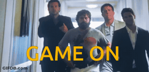 Group Of Men Walking Hallway Saying Game On GIF