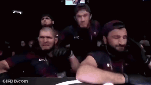 Group Of Men Watching Boxing Match Screaming GIF