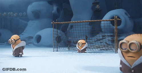 Group Of Minions Standing In Front Of Soccer Goal GIF