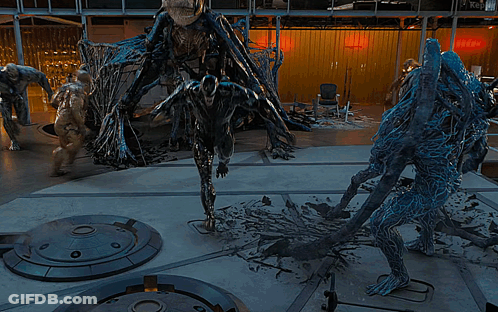 Group Of Monsters Standing In Room With Kepler GIF