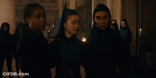 Group Of Nuns Standing Together GIF