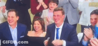 Group Of People Applauding In Room GIF
