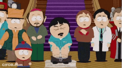 Group Of People Around Cartoon Sitting On Box GIF
