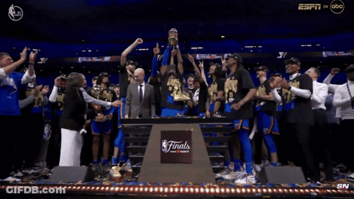 Group Of People Around Finals Podium GIF