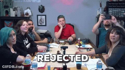 Group Of People Around Table With Rejected GIF