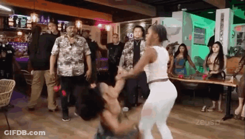 Group Of People Dancing In A Bar GIF