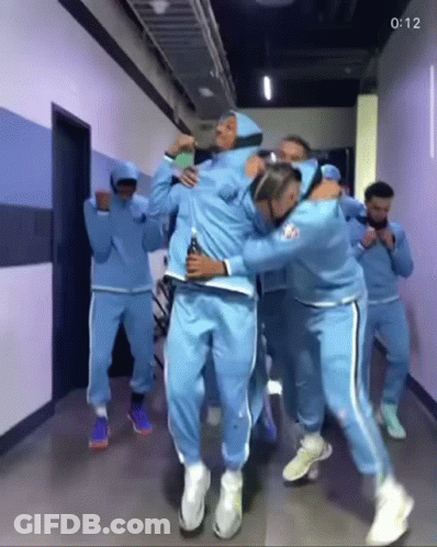 Group Of People Dancing In A Hallway GIF