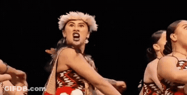 Group Of People Dancing In A Row On Stage GIF