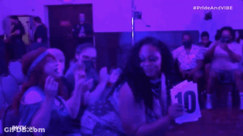 Group Of People Dancing In Dark Room GIF