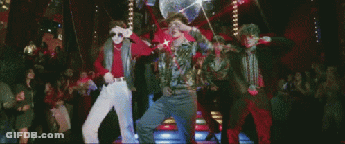 Group Of People Dancing In Disco Room GIF