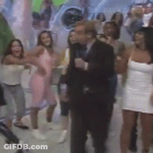 Group Of People Dancing In Front Of Cat Painting GIF