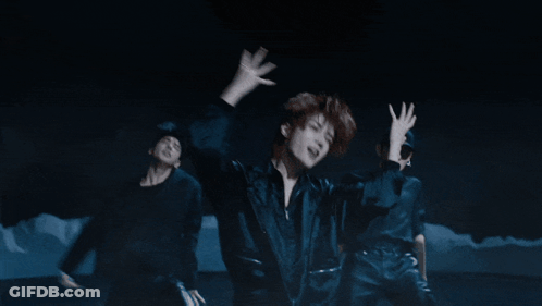 Group Of People Dancing In The Dark GIF