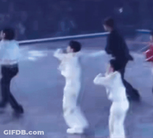 Group Of People Dancing On Blue Surface GIF