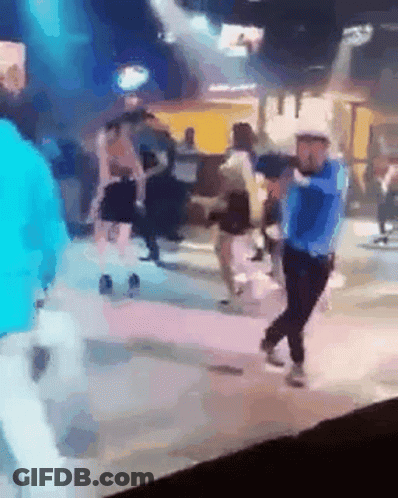 Group Of People Dancing On Stage In Club GIF