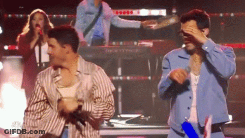 Group Of People Dancing On Stage GIF