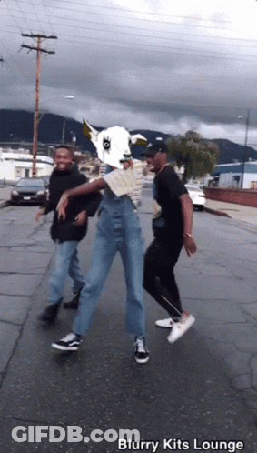 Group Of People Dancing On Street With Blurry Kits Lounge GIF