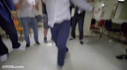 Group Of People Dancing Together GIF