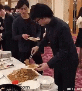 Group Of People Eating At Table GIF