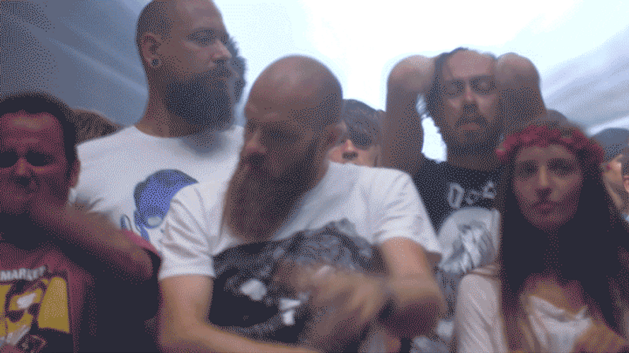Group Of People Headbanging GIF