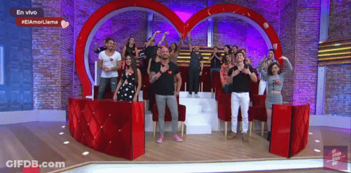 Group Of People Heart Shaped Stage En Vivo GIF