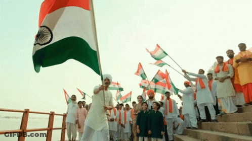 Group Of People Holding Indian Flags On Shore GIF