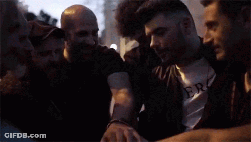 Group Of People In A Huddle GIF