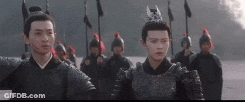 Group Of People In Armor In Front Of Building With Chinese Writing GIF