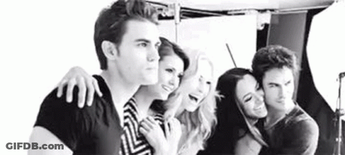 Group Of People In Black And White Photo GIF