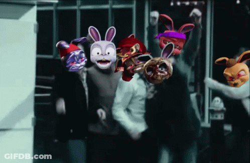 Group Of People In Bunny Masks Standing In Room GIF