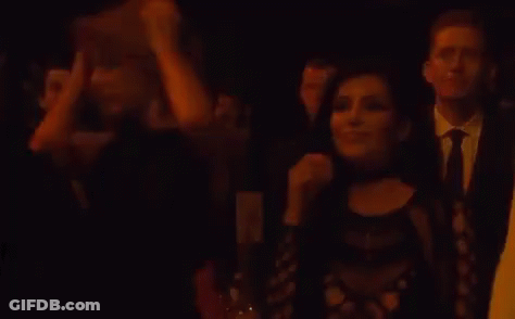 Group Of People In Dark Room GIF