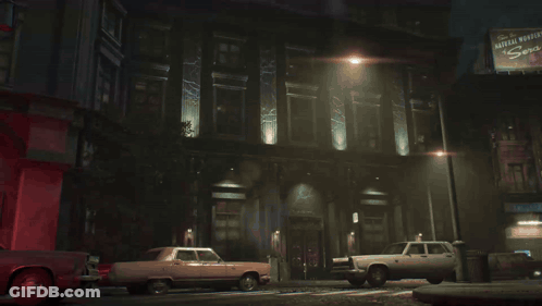 Group Of People In Dark Room With Car GIF