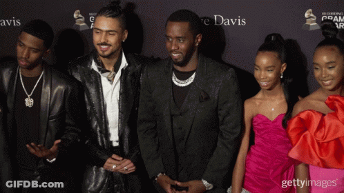 Group Of People In Front Of Davis Wall GIF