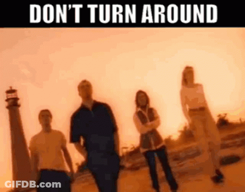 Group Of People In Front Of Lighthouse Don't Turn Around GIF