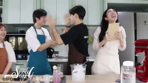 Group Of People In Kitchen With Seoul GIF