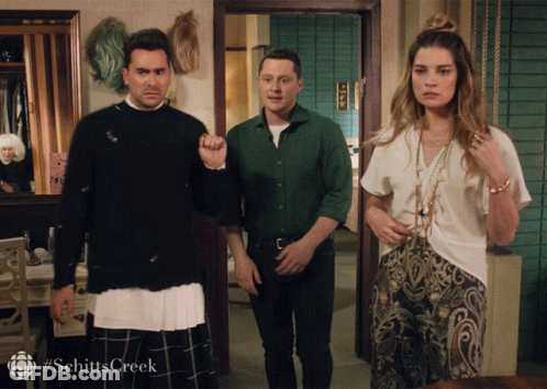 Group Of People In Room With Schitts Creek GIF