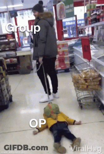 Group Of People In Store One Laying On Ground GIF