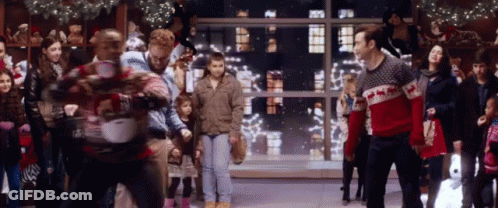 Group Of People In Ugly Sweaters Dancing GIF