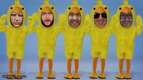 Group Of People In Yellow Duck Costumes GIF